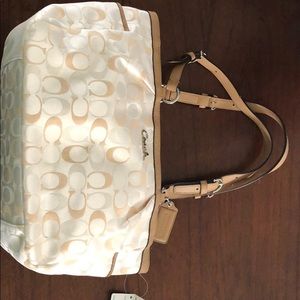 Authentic cream coach purse.